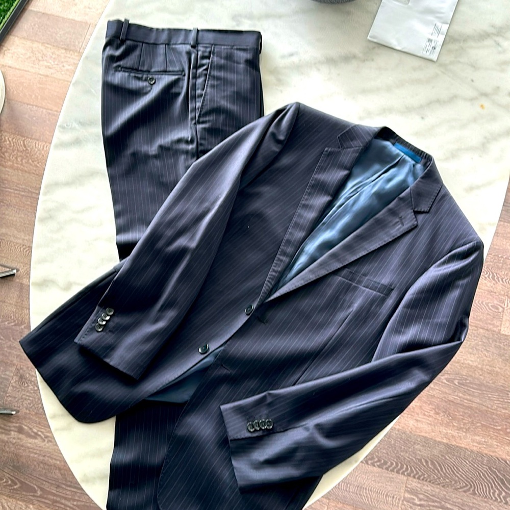Paul Betenely Navy Stripe Suit.